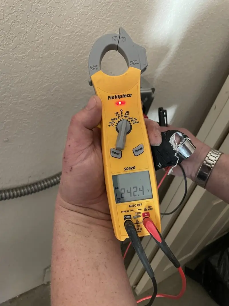 Voltage testing with clamp meter during Electrical Installation Services in Keyser